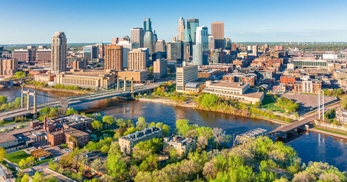 Technician performing chimney sweeping in Minneapolis
