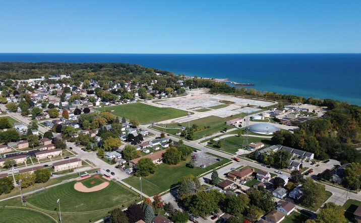 Technician performing chimney sweeping in South Milwaukee, WI